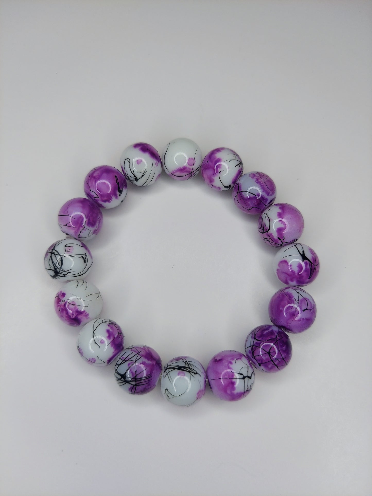 Purple and White 12mm Glass Beaded Bracelet